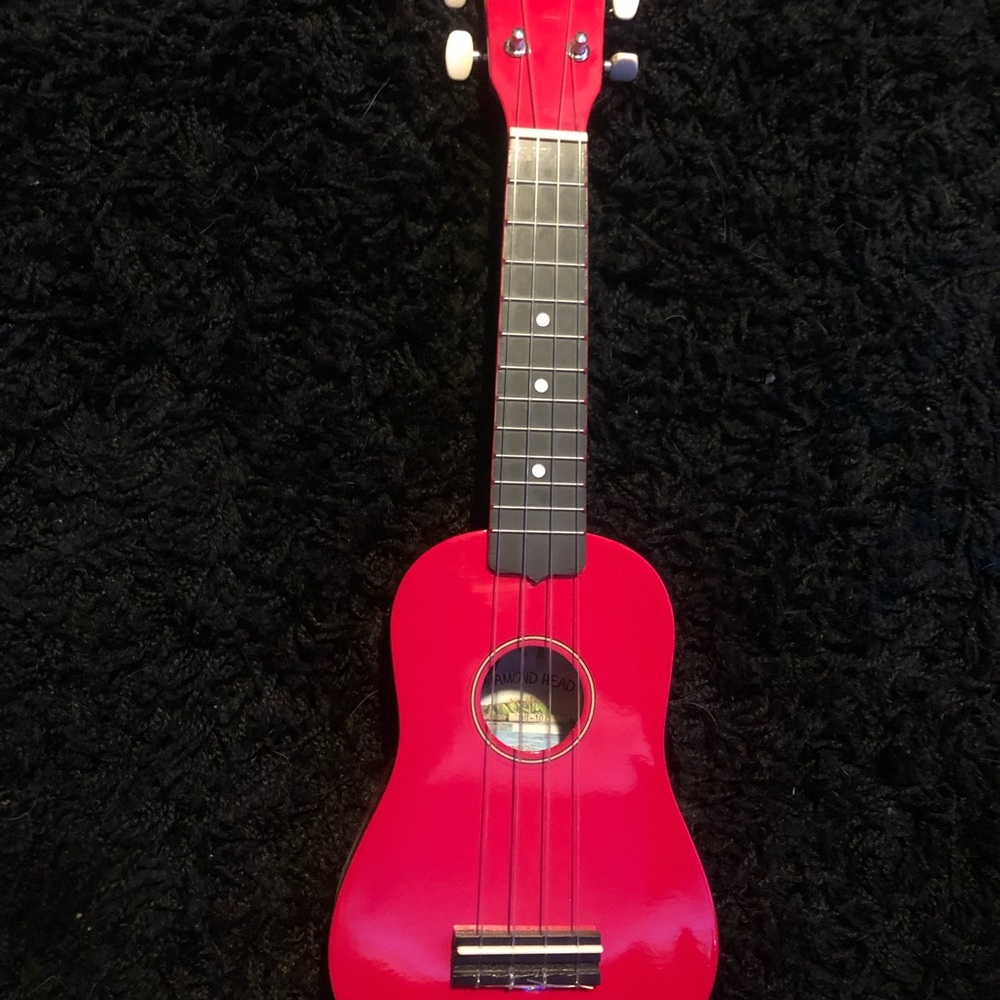 red diamond head ukulele with case